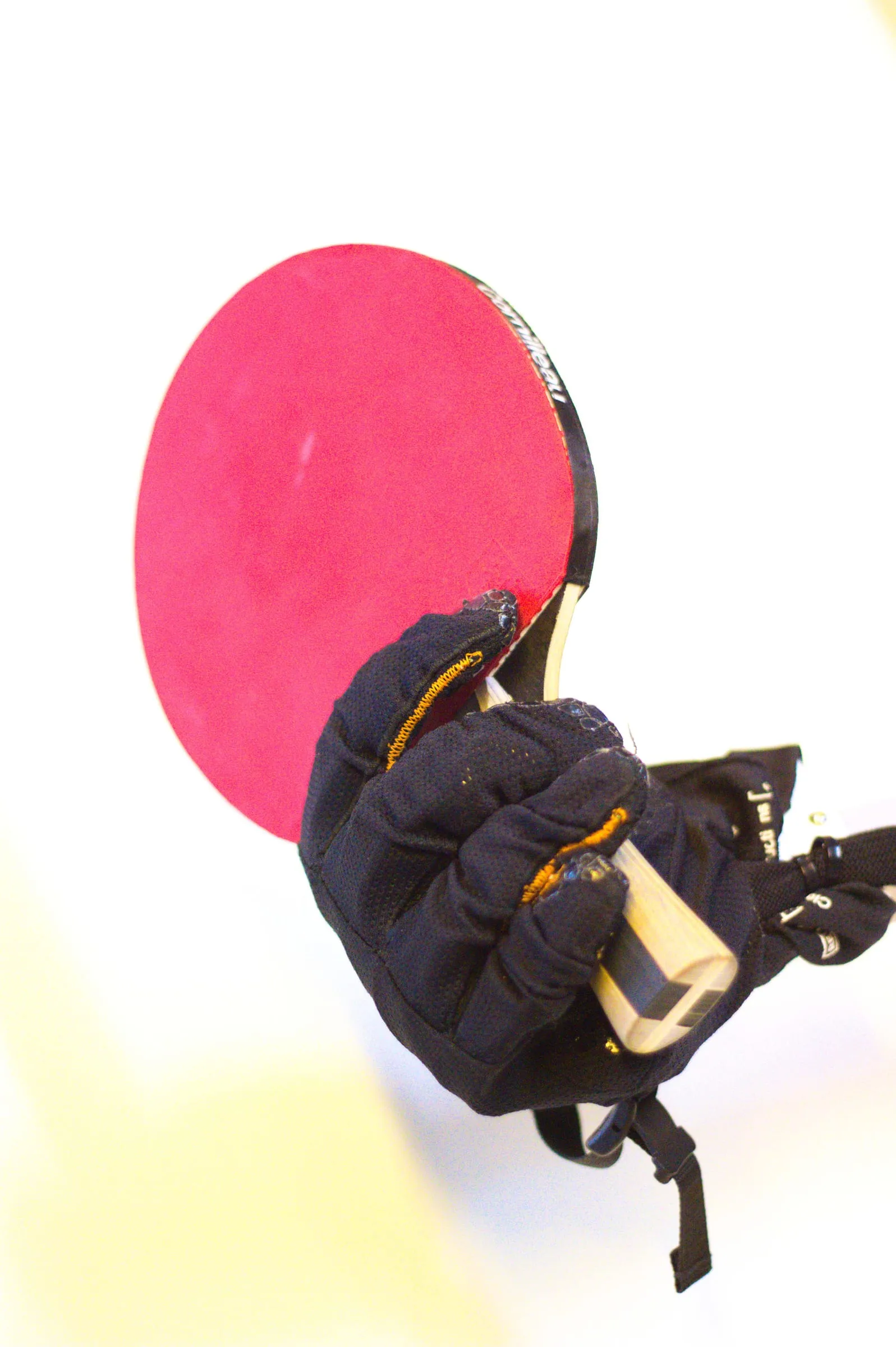 Gripping the edge of a table-tennis bat