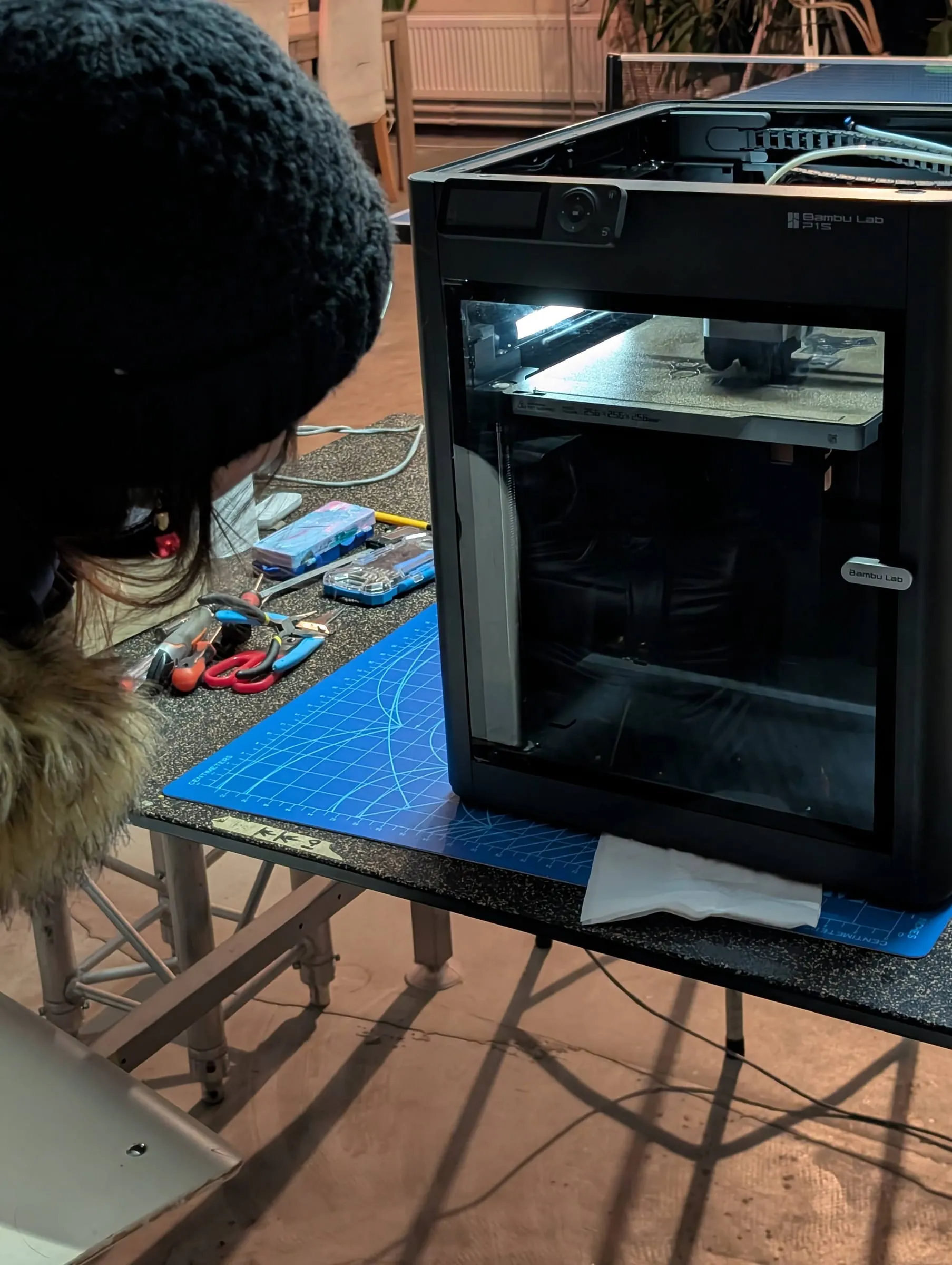 The client reviewing printed parts