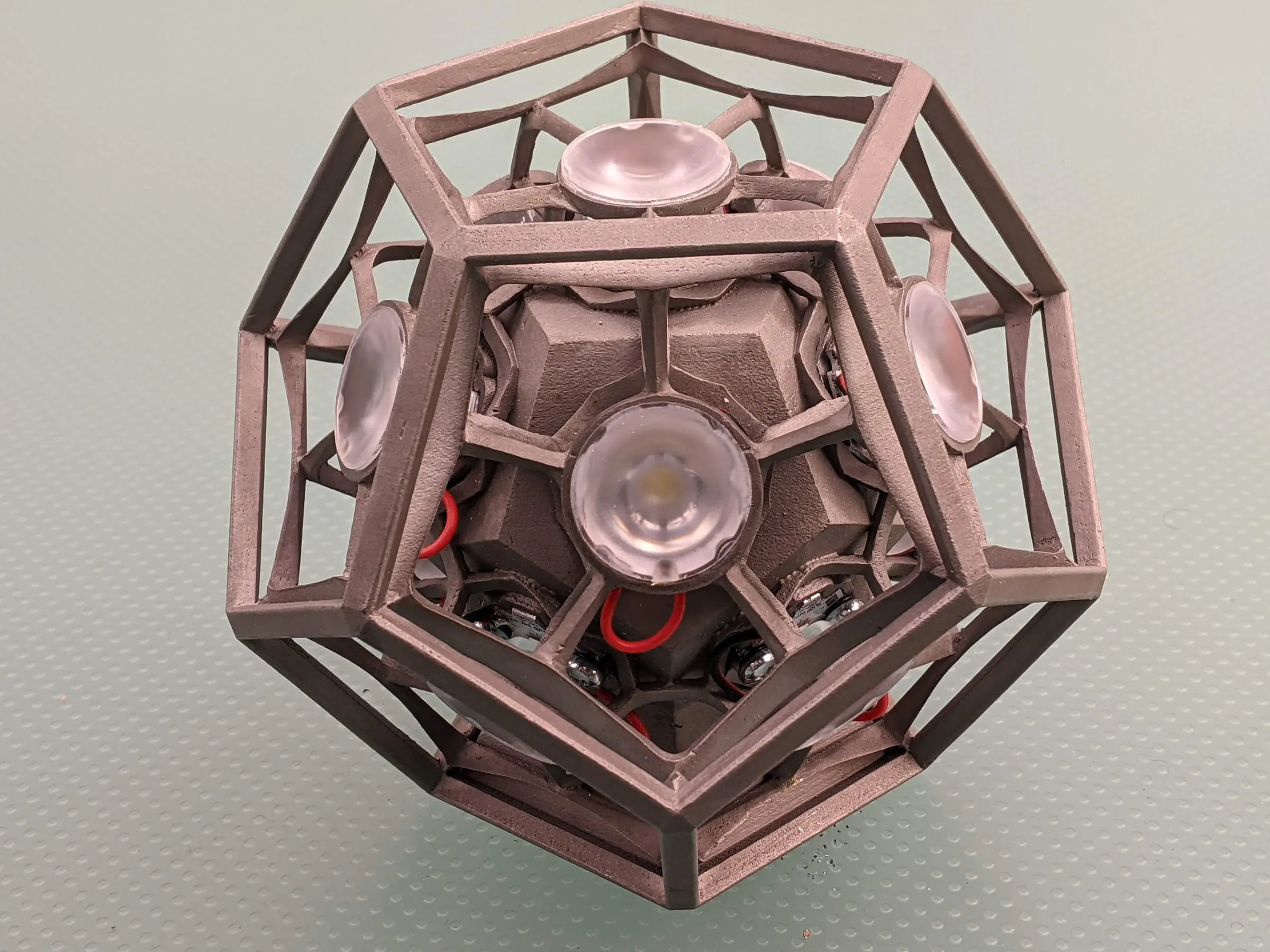 The finished Orb, its metal shell and internal mechanism assembled